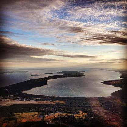 Aerial view of Old Mission Peninsula looking North with a dramatic sky