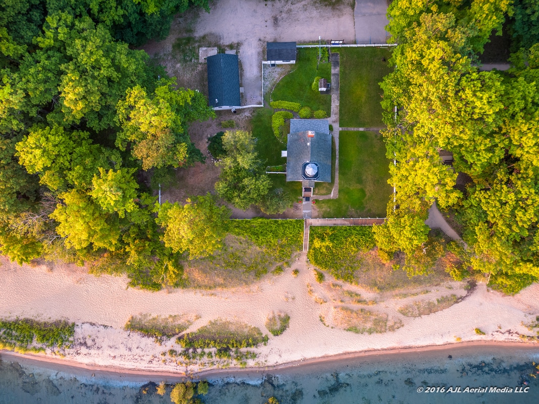 Drone aerial view of lighthouse and grounds